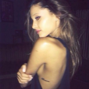 Ariana Grande paparazzi tattoo