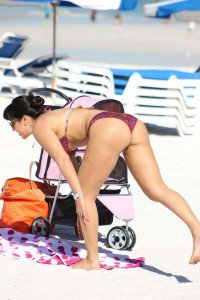Andrea Calle hits the beach in Miami, FL