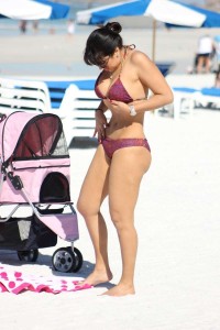 Andrea Calle hits the beach in Miami, FL