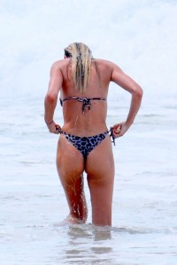 *EXCLUSIVE* Candice Swanepoel flaunts incredible bikini body in Brazil